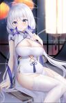  1girl azur_lane bangs blue_eyes blurry blush breasts china_dress chinese_clothes cleavage closed_mouth depth_of_field dress eyebrows_visible_through_hair garter_straps hair_ornament highres illustrious_(azur_lane) illustrious_(maiden_lily&#039;s_radiance)_(azur_lane) jyu-so large_breasts long_hair looking_at_viewer mole mole_under_eye official_alternate_costume short_sleeves side_slit sitting smile solo thighhighs thighs white_dress white_hair white_legwear 