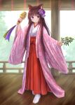  1girl animal_ear_fluff animal_ears bangs bell blue_eyes blunt_bangs blush branch brown_hair cat_ears closed_mouth commentary_request eyebrows_visible_through_hair flower full_body hair_flower hair_ornament hakama highres holding iroha_(iroha_matsurika) japanese_clothes jingle_bell kagura_suzu kimono long_hair long_sleeves looking_at_viewer miko mutsuki_(iroha_(iroha_matsurika)) open_clothes original purple_flower railing red_hakama smile socks solo standing tabi very_long_hair white_kimono white_legwear wide_sleeves 