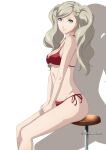  1girl bangs between_legs bikini blonde_hair blue_eyes breasts chair excaliblader hair_ornament hairclip halterneck hand_between_legs highres legs long_hair looking_at_viewer medium_breasts persona persona_5 red_bikini shadow side-tie_bikini simple_background sitting solo string_bikini swept_bangs swimsuit takamaki_anne twintails twitter_username white_background 