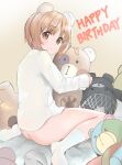  1girl absurdres animal_ears bandaid bear_ears birthday boko_(girls_und_panzer) bottomless closed_mouth commentary english_text eyebrows_visible_through_hair fake_animal_ears from_behind girls_und_panzer happy_birthday highres holding holding_stuffed_toy huge_filesize looking_at_viewer looking_back naked_shirt nishizumi_miho on_bed shirt sitting smile socks solo sounata_(sounanmaru) stuffed_toy wariza white_legwear white_shirt 