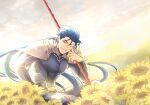  1boy armor beads betushio blue_bodysuit blue_hair bodysuit cu_chulainn_(fate)_(all) cu_chulainn_(fate/stay_night) earrings fate/stay_night fate_(series) field floating_hair flower flower_field gae_bolg_(fate) grin hair_beads hair_ornament head_rest highres holding holding_polearm holding_weapon jewelry long_hair looking_at_viewer male_focus muscular muscular_male one_eye_closed open_mouth outdoors pauldrons pectorals polearm ponytail red_eyes shoulder_armor sitting skin_tight sky slit_pupils smile solo spiked_hair sunflower weapon 