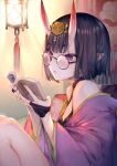  1girl bangs bare_shoulders bespectacled black-framed_eyewear black_hair blush book breasts cleavage closed_mouth eyebrows_visible_through_hair fate/grand_order fate_(series) glasses headpiece highres holding holding_book horns japanese_clothes kaguyuzu kimono knees_up lamp off_shoulder open_book open_clothes open_kimono purple_eyes purple_kimono round_eyewear short_hair shuten_douji_(fate) sitting skin-covered_horns small_breasts solo tassel 