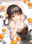  1girl absurdres arm_up bangs bare_shoulders black_camisole black_hair breasts camisole cleavage collarbone crystalherb food fruit hand_on_own_face highres holding holding_food licking_lips long_hair looking_at_viewer lying on_back orange_(food) orange_eyes original small_breasts solo spaghetti_strap strap_slip tongue tongue_out twintails water 