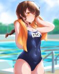  1girl alternate_costume arthur_ko blue_sky blue_swimsuit braid breasts brown_hair competition_school_swimsuit covered_navel cowboy_shot day highres kantai_collection long_hair name_tag one-piece_swimsuit orange_eyes orange_towel outdoors pool poolside school_swimsuit single_braid sky small_breasts solo souya_(kancolle) standing swimsuit 