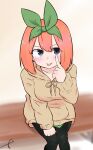  1girl :p akanbe bangs black_pants blue_eyes blush brown_hoodie closed_mouth eyebrows_behind_hair from_above go-toubun_no_hanayome green_ribbon hair_between_eyes hair_ribbon highres hood hood_down hoodie kujou_karasuma looking_at_viewer looking_up nakano_yotsuba orange_hair pants pantyhose ribbon signature sitting smile solo tongue tongue_out v-shaped_eyebrows 