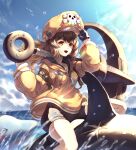  1girl absurdres anchor bangs bike_shorts brown_hair dolphin guilty_gear guilty_gear_strive hat highres hood hoodie long_hair looking_at_viewer may_(guilty_gear) nine7284 orange_eyes orange_headwear orange_hoodie skull_and_crossbones water 