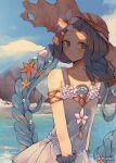  1girl arm_strap artist_name beach beige_headwear blue_dress blue_eyes blue_hair blue_sky braid breasts brooch closed_mouth cloud collarbone commentary cowboy_shot dress flower granblue_fantasy hair_flower hair_ornament hat highres jewelry light_particles lilinee long_hair looking_at_viewer lyria_(granblue_fantasy) mountain ocean outdoors pearl_hair_ornament pleated_dress shade shell_hair_ornament sky sleeveless sleeveless_dress small_breasts smile solo starfish_hair_ornament sun_hat twin_braids very_long_hair waves wrist_cuffs 