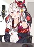  1girl :d bare_shoulders bell black_kimono blurry blurry_background blush chair collarbone depth_of_field double_bun fang gradient_hair hair_bell hair_ornament highres hololive horns japanese_clothes jingle_bell kimono long_hair mask mask_on_head microphone mizuki_ryuu mouse_(computer) mousepad_(object) multicolored_hair nakiri_ayame off_shoulder office_chair on_chair oni oni_horns oni_mask open_mouth red_eyes red_hair silver_hair sitting smile solo table upper_body upper_teeth very_long_hair virtual_youtuber 