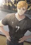  1boy bangs black_pants blonde_hair brown_eyes eyebrows haikyuu!! hands_on_hips hemoon indoors looking_at_viewer male_focus miya_atsumu multicolored_hair pants short_hair short_sleeves shorts smile solo sportswear standing two-tone_hair volleyball_uniform 