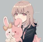  1girl animal_bag backpack bag bangs black_jacket bow cat_bag collared_shirt covered_mouth danganronpa_(series) danganronpa_2:_goodbye_despair ear_bow eyebrows_visible_through_hair flipped_hair grey_background grey_shirt hair_ornament hands_up holding_another hood jacket light_brown_hair looking_at_viewer medium_hair mogu_(flosnagi18) monomi_(danganronpa) nanami_chiaki neck_ribbon orange_bow pink_eyes pink_ribbon ribbon shiny shiny_hair shirt simple_background spaceship_hair_ornament twitter_username upper_body 