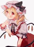  1girl bangs black_bow black_neckwear black_ribbon blonde_hair blush bow buttons cowboy_shot crystal eyebrows_visible_through_hair fingernails flandre_scarlet frilled_shirt_collar frills furrowed_brow hair_between_eyes hand_up hat hat_bow highres leaning_forward looking_at_viewer masanaga_(tsukasa) medium_hair mob_cap one_side_up parted_lips puffy_short_sleeves puffy_sleeves red_eyes red_skirt red_vest ribbon short_sleeves simple_background skirt solo touhou vest white_background wings wrist_cuffs 