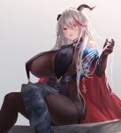  1girl aegir_(azur_lane) asymmetrical_footwear azur_lane black_cape bodystocking breast_curtains breasts cape crossed_legs demon_horns earrings hair_between_eyes highres horns huge_breasts iron_blood_(emblem) iron_cross jewelry long_hair looking_to_the_side mechanical_horns multicolored_hair red_hair silver_hair sittng streaked_hair uneven_footwear yellow_eyes yuuki_shuri 