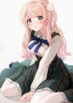  1girl :o between_legs blonde_hair blue_footwear blush bodice bow bowtie breasts buttons collared_shirt covering covering_crotch frilled_skirt frills green_eyes green_skirt hair_ornament hand_between_legs highres indie_virtual_youtuber long_hair looking_at_viewer pom_pom_(clothes) pom_pom_hair_ornament shigure_ui_(vtuber) shiny shiny_hair shirt shirt_tug shoes sidelocks simple_background sitting skirt solo takuo thighhighs underbust virtual_youtuber wariza white_background white_legwear wing_collar 