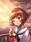  1girl akiyama_yukari bangs black_neckwear blouse brown_eyes brown_hair closed_mouth cloud cloudy_sky commentary_request cup disposable_cup drinking_straw eyebrows_visible_through_hair girls_und_panzer head_tilt holding holding_cup horizon long_sleeves looking_at_viewer messy_hair neckerchief ocean ooarai_school_uniform orange_sky outdoors partial_commentary railing sailor_collar school_uniform short_hair sky smile solo sparkle standing twilight white_blouse white_sailor_collar yu_sakurai06 