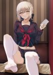  1girl artoria_pendragon_(all) bangs black_ribbon black_sailor_collar black_serafuku black_skirt blonde_hair braid breasts fate/stay_night fate_(series) french_braid hair_bun hair_ribbon kesoshirou long_hair long_sleeves looking_at_viewer neckerchief pleated_skirt red_neckwear ribbon saber_alter sailor_collar school_uniform serafuku sidelocks sitting skirt small_breasts thighhighs white_legwear yellow_eyes 