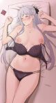  1girl ak-12_(girls&#039;_frontline) bed_sheet blush bra braid breasts closed_mouth condom condom_wrapper girls&#039;_frontline highres ichinose_(ichinose1592) long_hair looking_at_viewer lying medium_breasts navel nipples nose_blush on_back panties pillow ponytail purple_eyes silver_hair solo underwear 