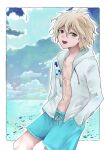  1boy bangs beach blonde_hair blush border cloud collarbone commentary_request cowboy_shot danganronpa_(series) danganronpa_2:_goodbye_despair danganronpa_s:_ultimate_summer_camp day green_eyes green_male_swimwear grey_jacket hand_in_pocket highres hood hood_down izumiuta_neko jacket komaeda_nagito looking_at_viewer male_focus male_swimwear navel open_clothes open_jacket outdoors outside_border shirt sky smile solo swim_trunks white_border 