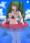  1girl bangs bare_arms bare_legs bare_shoulders bikini blue_bikini blush breasts cleavage collarbone dinergate_(girls&#039;_frontline) eyebrows_visible_through_hair girls&#039;_frontline green_hair highres in_water innertube long_hair looking_at_viewer m950a_(girls&#039;_frontline) navel outdoors parted_lips popoman purple_eyes sideboob standing swimsuit twintails water wet 