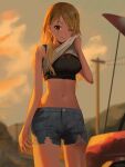  1girl blonde_hair clothes_lift crop_top denim earrings evening hair_over_one_eye highres idolmaster idolmaster_shiny_colors izumi_mei jewelry long_hair midriff navel one_eye_closed outdoors pants shirt_lift short_shorts shorts solo sports_bra spung standing sweat torn_clothes torn_pants wiping_sweat 