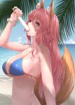  1girl absurdres animal_ear_fluff animal_ears bikini blue_bikini breasts cleavage eyebrows_visible_through_hair fate/extra fate/grand_order fate_(series) food food_on_breasts fox_ears fox_girl fox_tail highres ice ice_cream kamehito large_breasts long_hair looking_at_viewer looking_to_the_side nail_polish ocean outdoors palm_leaf palm_tree palms pink_hair pink_nails sexually_suggestive side-tie_bikini solo swimsuit tail tamamo_(fate) tamamo_no_mae_(swimsuit_lancer)_(fate) tongue tongue_out tree yellow_eyes 