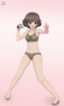  1girl absurdres acrux akiyama_yukari artist_logo barefoot bra breasts brown_bra brown_eyes brown_hair brown_panties brown_sports_bra camera camouflage camouflage_panties camouflage_sports_bra commentary dated english_commentary frown girls_und_panzer highres holding holding_camera medium_breasts messy_hair navel open_mouth panties pink_background pointing short_hair solo sports_bra standing underwear underwear_only video_camera 