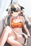  1girl absurdres arknights bikini black_hair black_shorts blush breasts brown_eyes ema_(kuguiema) feet_out_of_frame flower hair_between_eyes hair_intakes highres long_hair looking_at_viewer multicolored_hair orange_bikini shorts sitting small_breasts smile snowsant_(arknights) solo swimsuit thighs two-tone_hair white_flower white_hair 