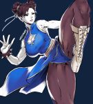  1girl artist_name boots bracelet breasts brown_hair china_dress chinese_clothes chun-li cleavage commentary cross-laced_footwear double_bun dress earrings eyelashes fighting_stance hair_bun highres jewelry large_breasts missfaves pantyhose parted_lips short_hair solo spiked_bracelet spikes standing standing_on_one_leg street_fighter teeth twitter_username white_footwear 