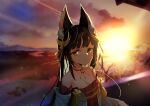  1girl absurdres animal_ear_fluff azur_lane bare_shoulders black_hair breasts cleavage cloud detached_sleeves dress hair_ornament highres looking_at_viewer nagato_(azur_lane) red_dress small_breasts solo strapless strapless_dress sunset uennn upper_body yellow_eyes 