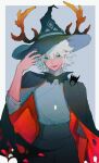  1boy absurdres arms_up bat black_cape black_nails cape deer_antlers enruyns green_eyes hat highres holding holding_clothes holding_hat horns open_mouth shadow short_hair sky:_children_of_the_light smile solo torn torn_clothes white_hair witch_hat 