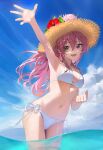  1girl arched_back arm_up bangs bare_shoulders bikini blue_sky breasts cloud commentary day eyebrows_visible_through_hair floating_hair flower foreshortening hair_between_eyes hair_intakes halterneck hat hat_flower hibiscus highres idolmaster idolmaster_cinderella_girls jougasaki_mika leaning_forward legs_together long_hair looking_at_viewer medium_breasts navel open_mouth outdoors pink_flower pink_hair red_flower side-tie_bikini sky smile solo standing straw_hat string_bikini suketoudara_(artist) swimsuit wading water white_bikini 