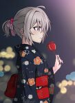  1girl antenna_hair bangs black_kimono blurry blurry_background brown_hair candy_apple city_lights closed_mouth festival food girls&#039;_frontline gotoo hair_between_eyes hair_ornament highres holding holding_food japanese_clothes kimono long_sleeves looking_to_the_side m200_(girls&#039;_frontline) medium_hair nail_polish night night_sky outdoors pink_nails ponytail purple_eyes sky smile solo 