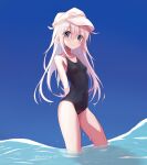  1girl bare_arms bare_legs bare_shoulders black_swimsuit blue_eyes blush breasts closed_mouth collarbone eyebrows_visible_through_hair hair_between_eyes hibiki_(kancolle) highres kantai_collection long_hair one-piece_swimsuit silver_hair small_breasts solo swimsuit tachakan twitter_username verniy_(kancolle) wet white_headwear 