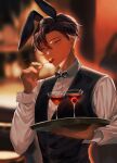  1boy alcohol animal_ears artist_name bishounen black_hair black_neckwear blurry blurry_background bow bowtie cherry cocktail_glass commentary_request cup dark-skinned_male dark_skin drinking_glass food food_in_mouth formal fruit grey_eyes hair_between_eyes hand_up highres holding holding_tray long_sleeves male_focus megechan mole mole_under_eye original rabbit_ears shirt short_hair solo suit tray upper_body very_short_hair waistcoat waiter white_shirt 
