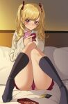  1girl blonde_hair blush bow bowtie cardigan cellphone closed_mouth condom condom_wrapper hair_ribbon highres holding holding_phone icarus_(632247131) kneehighs looking_at_viewer nijisanji panties pantyshot phone pink_eyes pink_panties red_neckwear red_ribbon red_skirt ribbon short_hair sitting skirt solo takamiya_rion twintails underwear virtual_youtuber wavy_mouth white_cardigan 