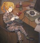  1girl 35th_marine_brigade bad_link belt belt_around_waist black_belt black_boots blonde_hair blue_eyes boots brown_jacket cable camouflage candy cargo_pants chocolate chocolate_bar coffee_maker coffee_mug commissioner_source crossed_legs cup digital_camouflage film_grain food fpv_drone_operator gun handgun handgun_stock head_tilt heater highres holding holding_cup jacket long_hair looking_at_viewer military_jacket military_operator mug omiglop open_collar open_mouth pants ponytail pouch revision russo-ukrainian_war sleeve_pouch smile solo stechkin_aps table tanya_degurechaff tanya_degurechaff_(sleepwalker) tongue ukraine ukrainian_marine_corps unworn_eyewear weapon youjo_senki 