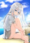  1girl ass bangs bare_legs barefoot blue_eyes blue_sky blurry cloud cloudy_sky commentary_request day depth_of_field eyebrows_visible_through_hair eyes_visible_through_hair from_side head_tilt highres horizon kanaria_hisagi long_hair looking_at_viewer looking_to_the_side naruse_shiroha ocean pleated_skirt school_uniform serafuku short_sleeves sidelocks sitting skirt sky solo summer_pockets wall white_hair 