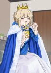  1girl absurdres artoria_pendragon_(fate) blue_cloak blue_shirt blush chopsticks cloak closed_eyes closed_mouth commentary_request crown cup cup_ramen eating fate/stay_night fate_(series) food_in_mouth fur_trim hair_bun highres holding holding_chopsticks holding_cup notonaon photo-referenced saber_(fate) shirt skirt solo white_skirt 