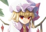  1girl ascot bangs blonde_hair blunt_bangs blurry blurry_foreground bow closed_mouth commentary_request crystal depth_of_field epiki_(nenekoneko0715) eyebrows_visible_through_hair flandre_scarlet frilled_shirt_collar frills hat hat_bow highres light_smile long_hair looking_at_viewer mob_cap one_side_up red_bow red_eyes red_vest simple_background solo touhou tsurime upper_body vest white_background white_headwear wings yellow_neckwear 