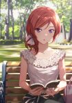  1girl alternate_costume bag bangs bench blouse book day eyebrows_visible_through_hair frills grass hair_ornament hair_scrunchie handbag holding holding_book looking_at_viewer love_live! love_live!_school_idol_project medium_hair nishikino_maki open_mouth outdoors purple_eyes reading red_hair scrunchie shamakho shirt side_ponytail sitting sleeveless sleeveless_shirt solo tree upper_body white_blouse 