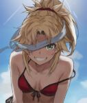  1girl bangs bare_shoulders bikini blindfold blindfold_slip blonde_hair blue_sky blush braid breasts collarbone fate/grand_order fate_(series) french_braid green_eyes grin hair_ornament hair_scrunchie highres long_hair looking_at_viewer mordred_(fate) mordred_(swimsuit_rider)_(fate) parted_bangs ponytail red_bikini scrunchie sidelocks sky small_breasts smile solo swimsuit tonee 