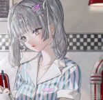  1girl blue_shirt commentary diner grey_eyes grey_hair hair_ornament hairclip highres holding holding_notepad holding_pen indoors jukebox name_tag notepad original oto1_030 pen shirt solo striped_clothes striped_shirt twintails untranslatable_commentary waitress white_shirt 