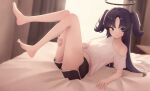  1girl barefoot black_shorts blue_archive breasts commentary_request dolphin_shorts feet halo highres long_hair mechanical_halo medium_breasts on_bed purple_eyes purple_hair shirt shorts single_bare_shoulder soles solo stellated_icosahedron toes two_side_up very_long_hair white_shirt yuuka_(blue_archive) 