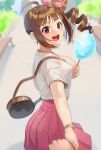  1girl ahoge bag bangs blurry blurry_background blurry_foreground bracelet brown_hair carrying commentary cotton_candy day depth_of_field drill_hair eyebrows_visible_through_hair food from_behind hair_ribbon handbag high-waist_skirt holding holding_food holding_hands idolmaster idolmaster_million_live! jewelry kamille_(vcx68) looking_at_viewer looking_back medium_hair miniskirt necklace open_mouth outdoors pink_ribbon pink_skirt pleated_skirt pov purple_eyes ribbon shirt short_sleeves side_drill side_ponytail sidelocks skirt smile standing white_shirt yokoyama_nao 