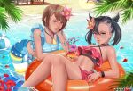  2girls beach black_hair brown_hair crazy_straw criss-cross_halter drinking_straw exlic feet_out_of_frame flower gloria_(pokemon) hair_flower hair_ornament halterneck heart_straw innertube looking_at_viewer marnie_(pokemon) midriff multiple_girls navel official_alternate_costume pokemon pokemon_(game) pokemon_masters_ex swimsuit water wristband 