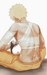  1boy back bandages behindxa blonde_hair chinese_commentary forehead_protector holding male_focus naruto naruto_(series) short_hair simple_background sitting solo uzumaki_naruto white_background 