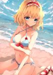  1girl alice_margatroid bad_id bad_pixiv_id bangs bare_shoulders barefoot beach bikini blonde_hair blue_bikini blue_bow blue_bra blue_eyes blue_panties blue_sky bow bra breasts closed_mouth cloud cloudy_sky eyebrows_visible_through_hair hair_between_eyes hairband hand_on_own_arm highres hunya looking_at_viewer medium_breasts ocean panties red_bow red_footwear red_hairband sand seiza shoes short_hair sitting sky solo swimsuit touhou underwear water 