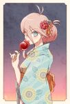  1girl antenna_hair bangs blonde_hair blue_eyes blue_kimono border braid breasts candy_apple commentary danganronpa_(series) danganronpa_v3:_killing_harmony eyebrows_visible_through_hair floral_print flower food from_side gradient gradient_background hair_flower hair_ornament hakusoto holding iruma_miu japanese_clothes kimono licking long_hair looking_at_viewer obi open_mouth pink_hair red_flower sash short_hair smile solo symbol-only_commentary tongue tongue_out white_border wide_sleeves yukata 