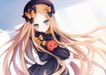  1girl abigail_williams_(fate) bangs black_bow black_dress black_headwear blonde_hair blue_eyes blush bow breasts dress fate/grand_order fate_(series) forehead hair_bow hat highres kurumi_mashiro long_hair long_sleeves looking_at_viewer multiple_bows orange_bow parted_bangs polka_dot polka_dot_bow ribbed_dress sleeves_past_fingers sleeves_past_wrists small_breasts stuffed_animal stuffed_toy teddy_bear very_long_hair 