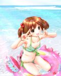  1girl bikini blue_sky breasts brown_hair cloud commentary_request cowboy_shot day double_v green_bikini hair_bobbles hair_ornament highres horizon innertube looking_at_viewer ocean original outdoors sky small_breasts smile solo swimsuit tsukino_miyu twintails v yellow_eyes 