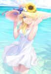  1girl beach blonde_hair blue_eyes bow dress flower gogo_(detteiu_de) hat hat_bow hat_flower hat_over_one_eye highres kingdom_hearts kingdom_hearts_chain_of_memories light_rays namine ocean partially_submerged sleeveless sleeveless_dress smile solo standing straw_hat white_dress 